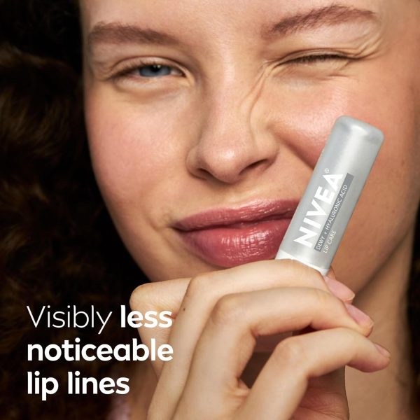⁦NIVEA Dewy Lip Care with Hyaluronic Acid, Lip Balm Leaves Visibly Less Noticeable Lip Lines and No Waxy Feel, 0.18 Oz, Pack of 4⁩ - الصورة ⁦3⁩