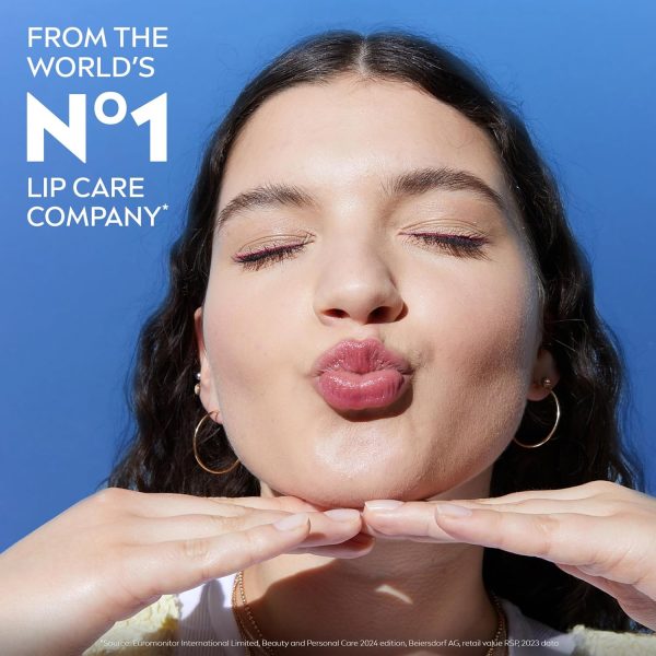 ⁦NIVEA Dewy Lip Care with Hyaluronic Acid, Lip Balm Leaves Visibly Less Noticeable Lip Lines and No Waxy Feel, 0.18 Oz, Pack of 4⁩ - الصورة ⁦12⁩