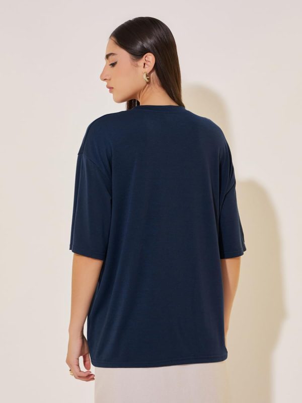 ⁦Styli Women's Slogan Print Short Sleeve Oversized T-Shirt⁩ - الصورة ⁦6⁩