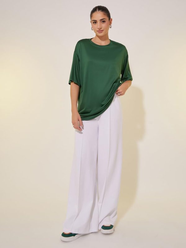 ⁦Styli Womens Green Slogan Print Short Sleeve Oversized T-Shirt⁩ - الصورة ⁦3⁩