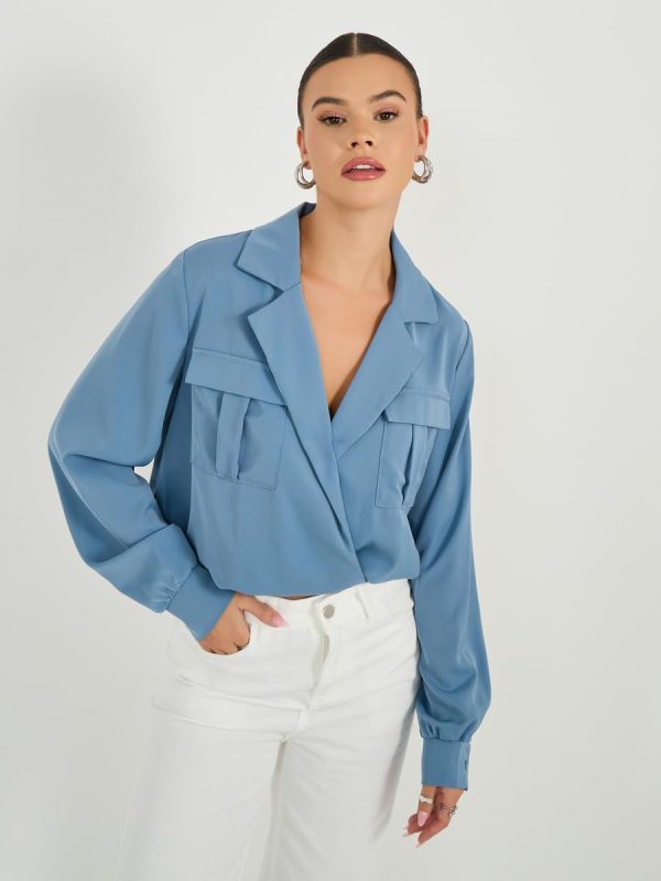 ⁦Styli Women's Wrap Notch Collar Blouse With Pocket Detail⁩ - الصورة ⁦2⁩