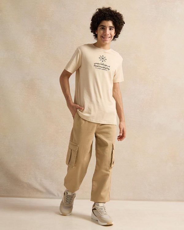 ⁦REDTAG Senior Boys Beige Cargo Jogger Trousers⁩ - الصورة ⁦2⁩