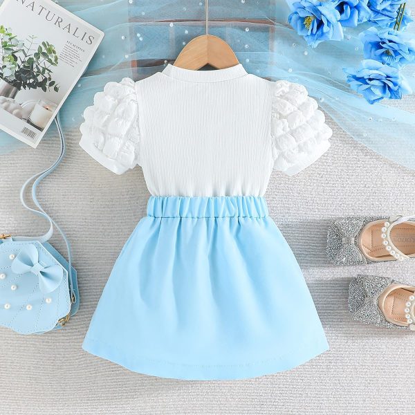 ⁦Guodeunh Toddler Girl Summer Outfits Puff Short Sleeve Ribbed Knit Tops Mini Skirt Set Cute Girl Clothes⁩ - الصورة ⁦3⁩