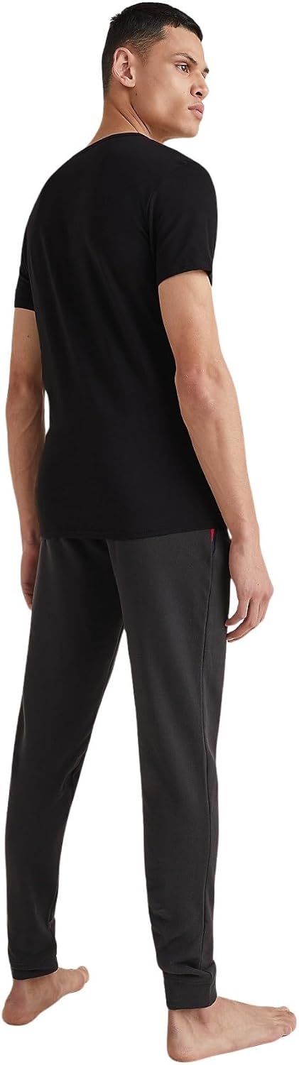 تي شيرت قطني داخلي مرن بأكمام قصيرة للرجال من تومي هيلفيجر، طقم من 3 قطع، لون أسود، مقاس XXL 2 تي شيرت قطني داخلي مرن بأكمام قصيرة للرجال من تومي هيلفيجر، طقم من 3 قطع، لون أسود، مقاس XXL - الصورة 2