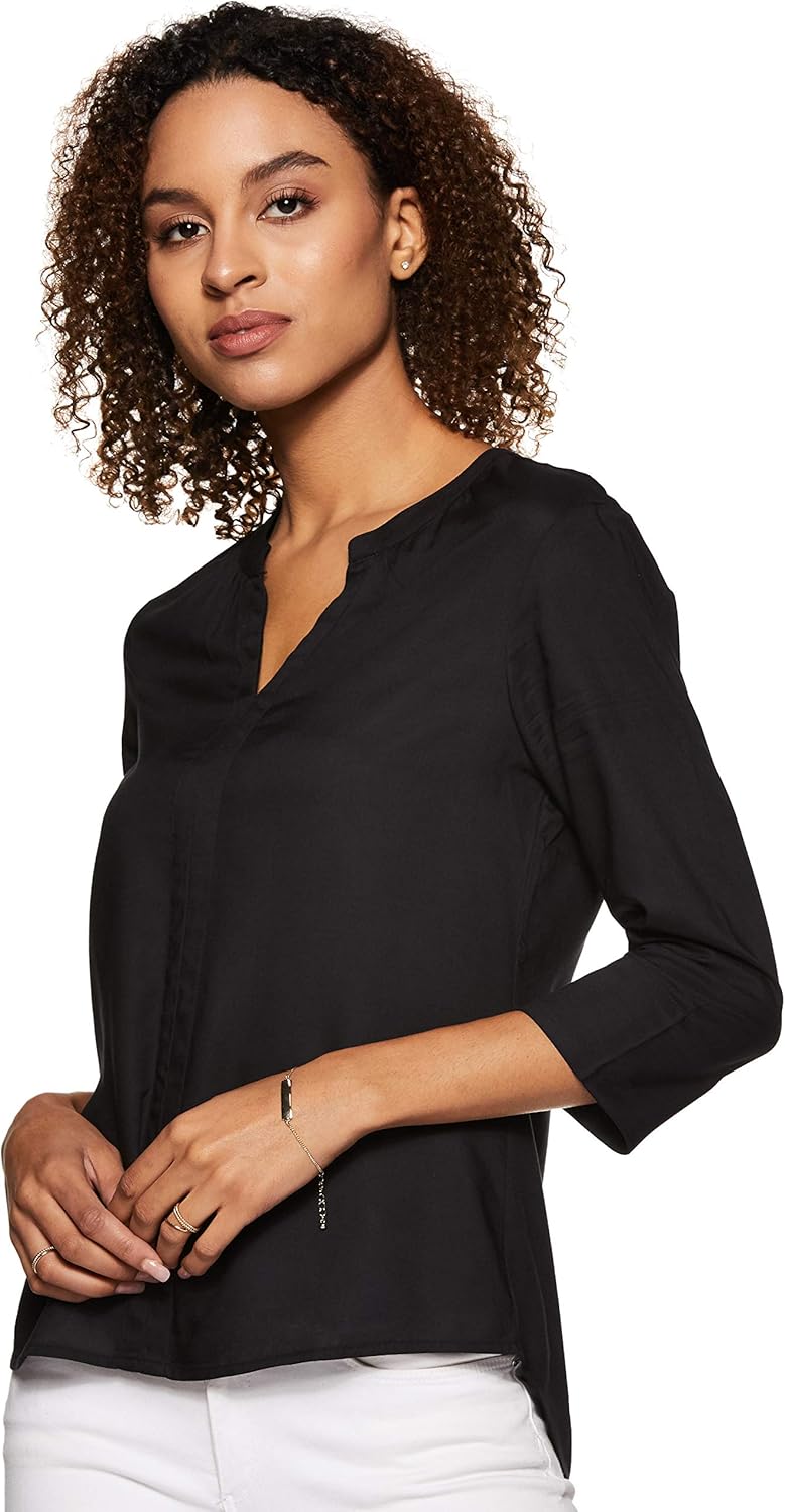 بلوزة بقصة عادية للنساء ولون سادة من أمازون براند - سيمبول 1 بلوزة بقصة عادية للنساء ولون سادة من أمازون براند - سيمبول