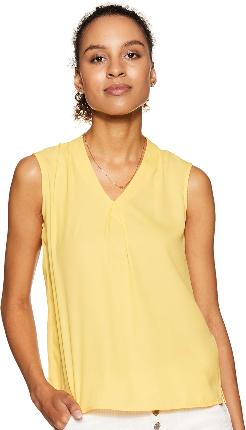 بلوزة بقصة عادية للنساء ولون سادة من علامة أمازون التجارية - سيمبول 1 بلوزة بقصة عادية للنساء ولون سادة من علامة أمازون التجارية - سيمبول