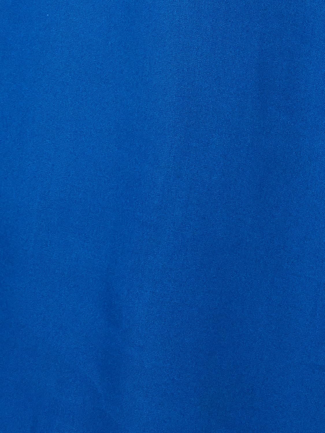 1772924520 بلوزة بقصة عادية للنساء ولون سادة من أمازون براند سيمبول